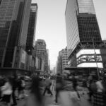 Haoting Wang - Black and white city scene with motion blur of people walking 